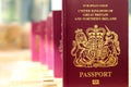 Five British United Kingdom European Union Biometric passports s Royalty Free Stock Photo