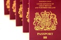 Five British United Kingdom European Union Biometric passports s Royalty Free Stock Photo