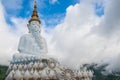 Five Buddha statues sitting at Wat Pha Sorn Kaew Temple in Khao Kho, Phetchabun Province, Thailand.