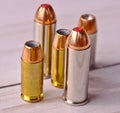 Five bullets, two 44 special and three 40 caliber hollow points Royalty Free Stock Photo