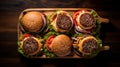 Top View Tabletop Photography Of Four Hamburgers On Wooden Tray