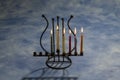 Five burning Hanukkah candles in Menorah Royalty Free Stock Photo