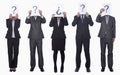 Five business people holding up paper with question mark, obscured face, studio shot Royalty Free Stock Photo