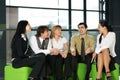 Five business persons are having a conversation Royalty Free Stock Photo