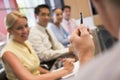 Five businesspeople at boardroom table Royalty Free Stock Photo