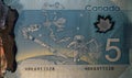 Five Canadian Dollar banknote with International Space Station printed on back