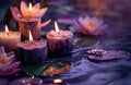 five candle stand on a purple background with lotus flower and a lotus ring Royalty Free Stock Photo