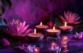 five candle stand on a purple background with lotus flower and a lotus ring Royalty Free Stock Photo