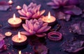 five candle stand on a purple background with lotus flower and a lotus ring Royalty Free Stock Photo