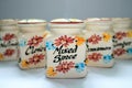 Five ceramic spice jars