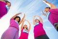 Five cheering runners supporting breast cancer marathon Royalty Free Stock Photo