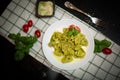 Five Cheeses ravioli with pesto