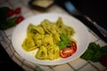 Five Cheeses ravioli with pesto