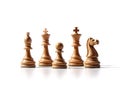 Five chess pieces aligned in perfect row on white background. Great for game tutorials, strategic branding, and Royalty Free Stock Photo