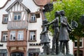 five children holding lanterns, historical landmark market square with lantern Festival fountain monument created by artist Harri