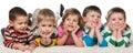 Five children lying on the carpet Royalty Free Stock Photo