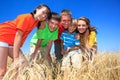 Five children in wheat field Royalty Free Stock Photo