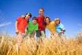 Five children in wheat field Royalty Free Stock Photo