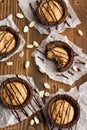 Five chocolate striped buscuits and peanuts