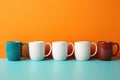 Five coffee cups lined up against an orange wall, AI Royalty Free Stock Photo