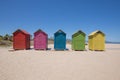 Five colored bathing huts at Beach in Grao of Castellon Royalty Free Stock Photo