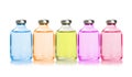 Five colored bottles with essential oils Royalty Free Stock Photo