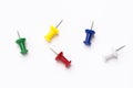 Five colored push pins