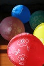 five colorful balloons in vertical photo format