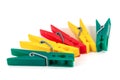 Five colorful plastic clothespins Royalty Free Stock Photo