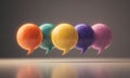 Five colorful speech bubble icons in a row on reflective surface Royalty Free Stock Photo
