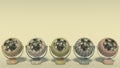 Five colorful vintage retro fans with a pattern stand in a row. Isolated fans on a yellow-green background with space for text. 3