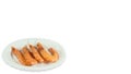 Five cooked shrimps serving on white plate Royalty Free Stock Photo