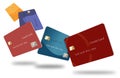 Five credit cards in various colors float through the air in this image.