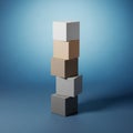 Five cubes in varying shades from white to different browns, arranged on a Royalty Free Stock Photo
