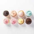 Top View Of Five Cupcakes In Uneven Row With Coffee On White Background Royalty Free Stock Photo
