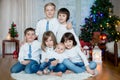 Five cute children, brothers, sister, siblings and friends, having fun on Christmas Royalty Free Stock Photo