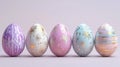 Five Decorated Easter Eggs in a Row on a Light Purple Background Royalty Free Stock Photo