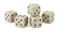 Five dice with a marble-like texture, featuring cracks and a beige color, are displayed. Royalty Free Stock Photo