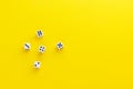 Five dice showing different sides on yellow background. Playing cube with numbers. Items for board games. Flat lay  top view with Royalty Free Stock Photo