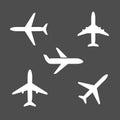 Five different airplane silhouette icons