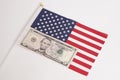 Five Dollar On American Flag On White Royalty Free Stock Photo