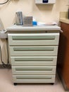 Five Drawer Medical Cabinet with in a doctors office Royalty Free Stock Photo