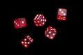 Five falling translucent red dices on black background Royalty Free Stock Photo