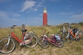 Five family bicycles against a red beacon Royalty Free Stock Photo