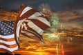 Five Fireworks Blast at 4th of July celebration in the United States flag sunset with clouds Royalty Free Stock Photo