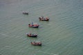 Five fishing traditional boats lying on the sea