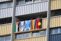 Five Flags Hanging Outside a High Rise Flat Balcony