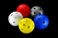 Five floorball balls isolated Royalty Free Stock Photo