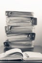 Five folders with documents stacked in a pile on the table. Blac Royalty Free Stock Photo