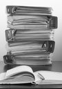 Five folders with documents stacked in a pile on the table. Blac Royalty Free Stock Photo